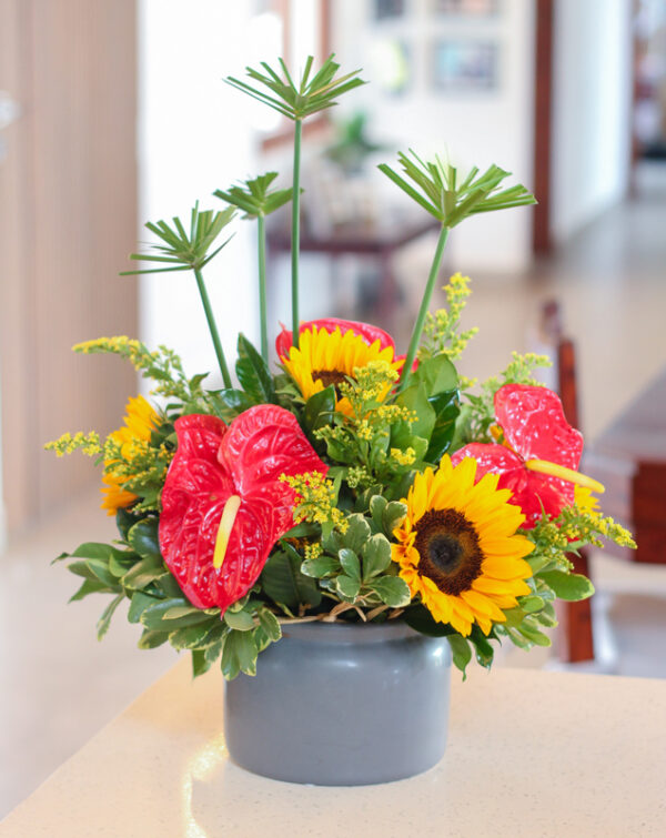 arreglo floral con girasoles